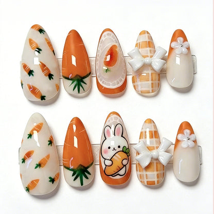 Kunstnagelset mit frühlingshaften Karotten- und Hasenmuster Brehn