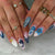 Kunstvolle 3D Nagelspitzen mit maritimen Motiven Brehn
