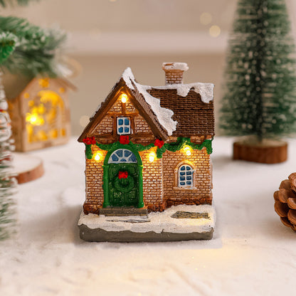 Dekoratives Weihnachtsdorf mit Lichtern Brehn