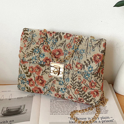 Blumengemusterte Abendtasche