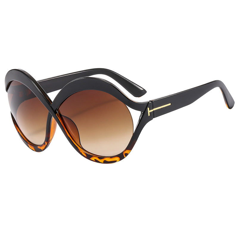 Damen extravagante Cat-Eye Sonnenbrille mit geschwungenem Rahmen Brehn