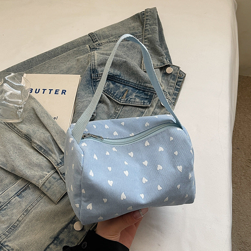Hübsche Handtasche mit Herzmuster