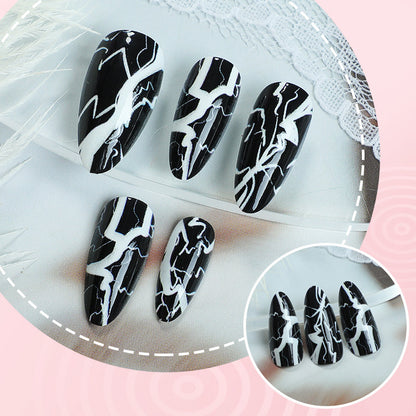 Stylisches Künstlerisches Press-On Nagelkunst Set mit Blitzdesign