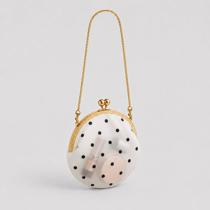 Elegante gepunktete Clutch-Handtasche