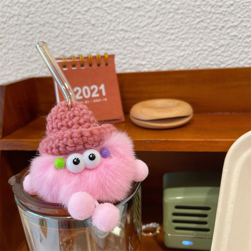 Verspielter Fuzzy Charakter Schlüsselanhänger Brehn