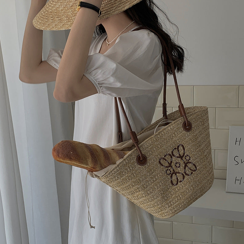 Damen Elegante Handtasche aus geflochtenem Naturmaterial mit luxuriösen Ledergriffen Brehn