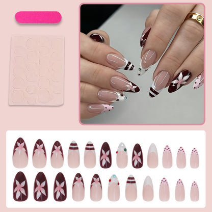Kunstnagelset mit floralem Design und Glitzerakzenten Brehn