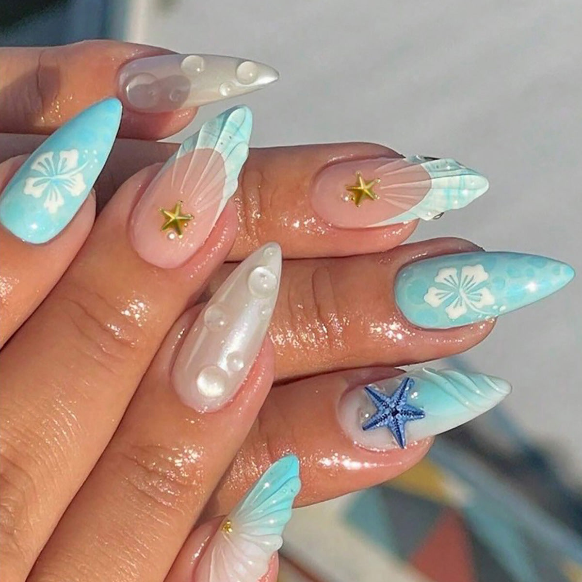 Kunstnagelset mit Meeresmotive und 3D-Akzenten Brehn