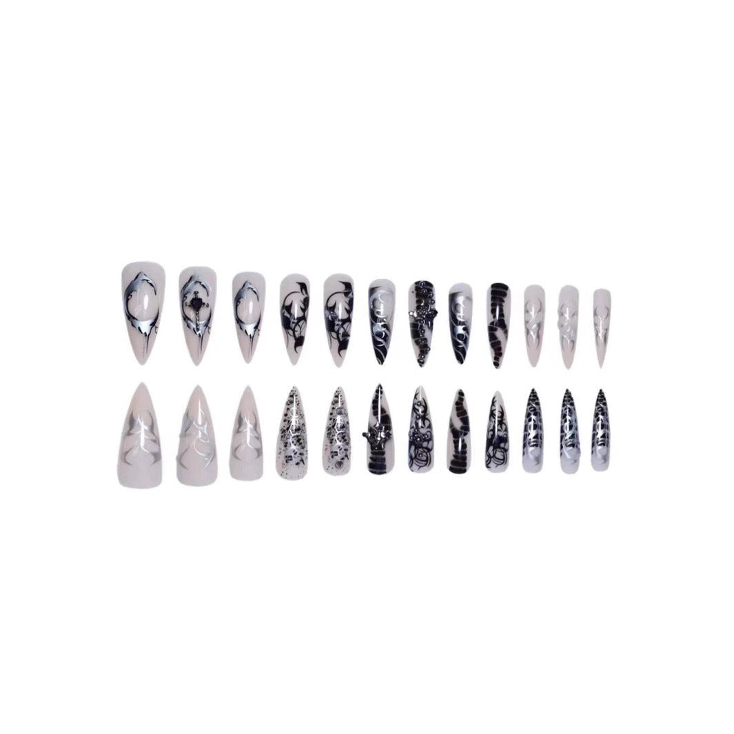 Künstlerische Stiletto-Nagelverlängerungen mit schwarzen Details Brehn