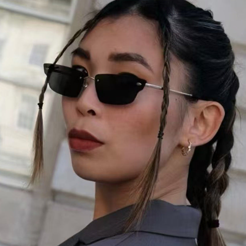 Damen geometrische Sonnenbrille mit filigranem Rahmen und transparenten Gläsern Brehn