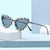 Damen Herzförmige Designer-Sonnenbrille mit glamourösem Kristallrahmen Brehn