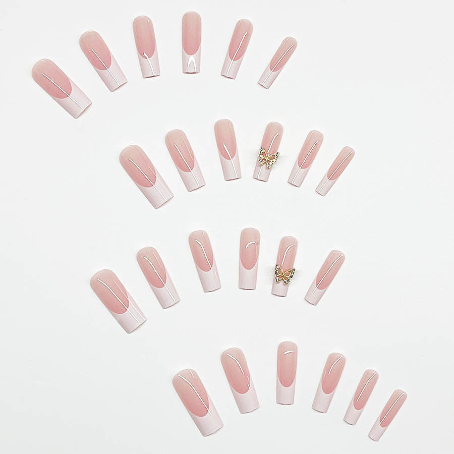 Elegantes Kunstnagelset mit Schmetterlingsakzenten Brehn