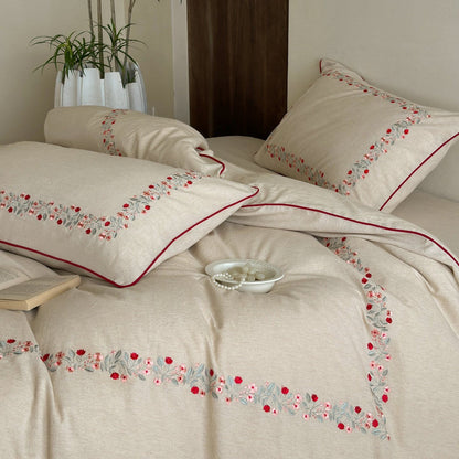Hochwertiges Baumwoll-Leinen Bettwäsche-Set mit feiner Blumenstickerei und Paspelrand