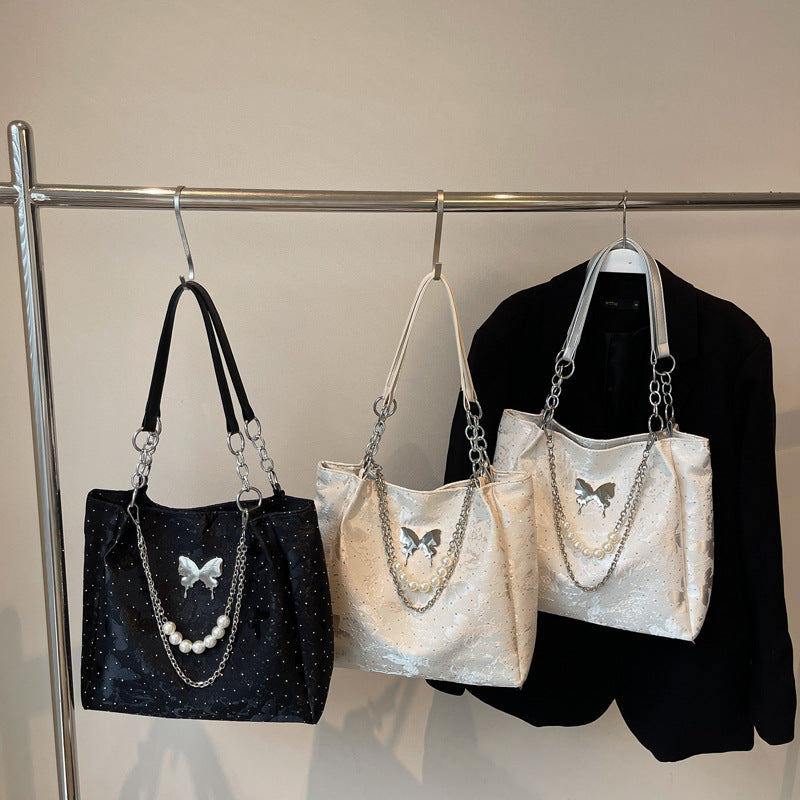 Elegante Handtasche mit Perlendetails Brehn