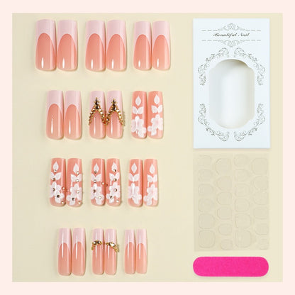 Kunstnagelset mit raffinierten Blüten- und Glitzerelementen Brehn