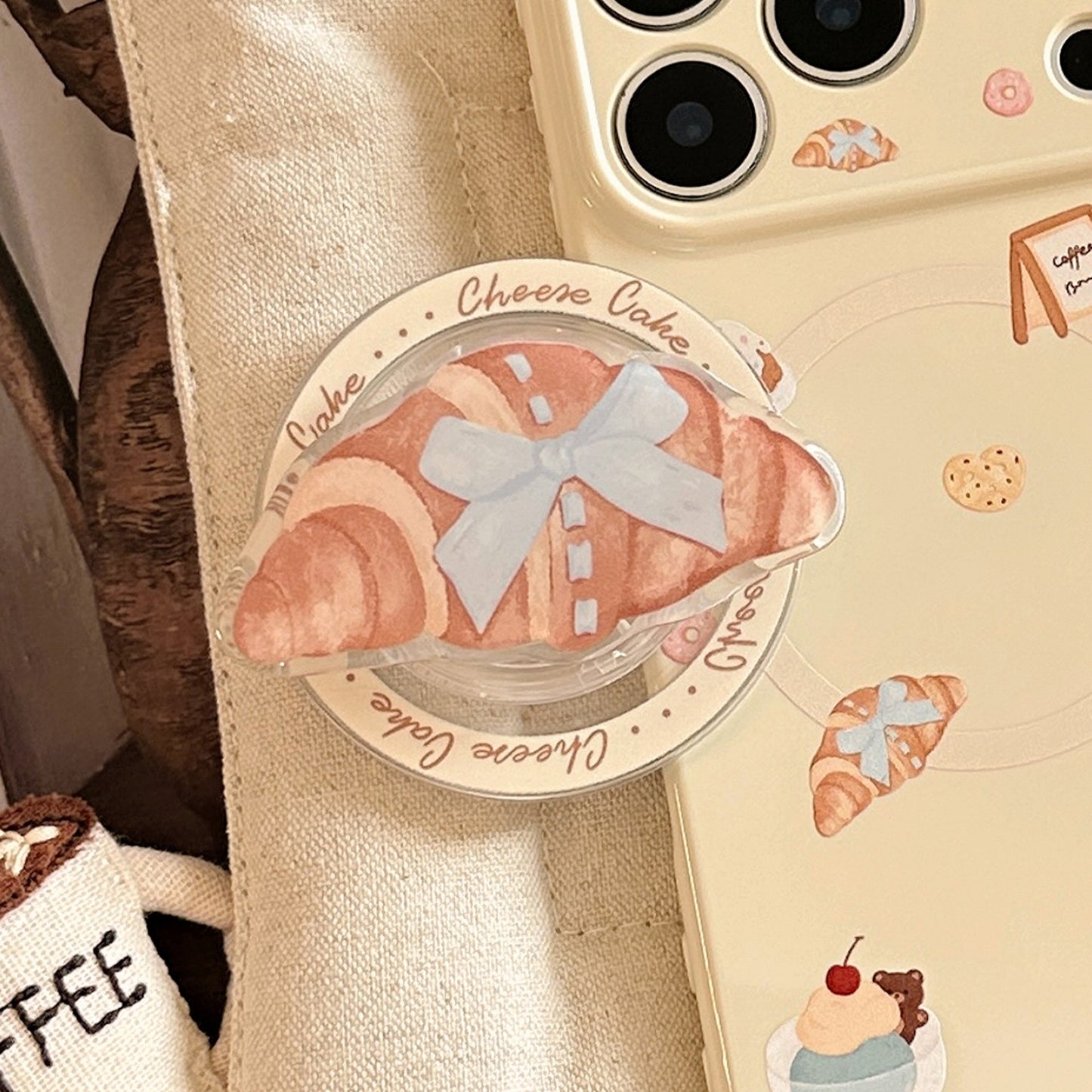 Smartphone Fingerhalter im Croissantdesign Brehn