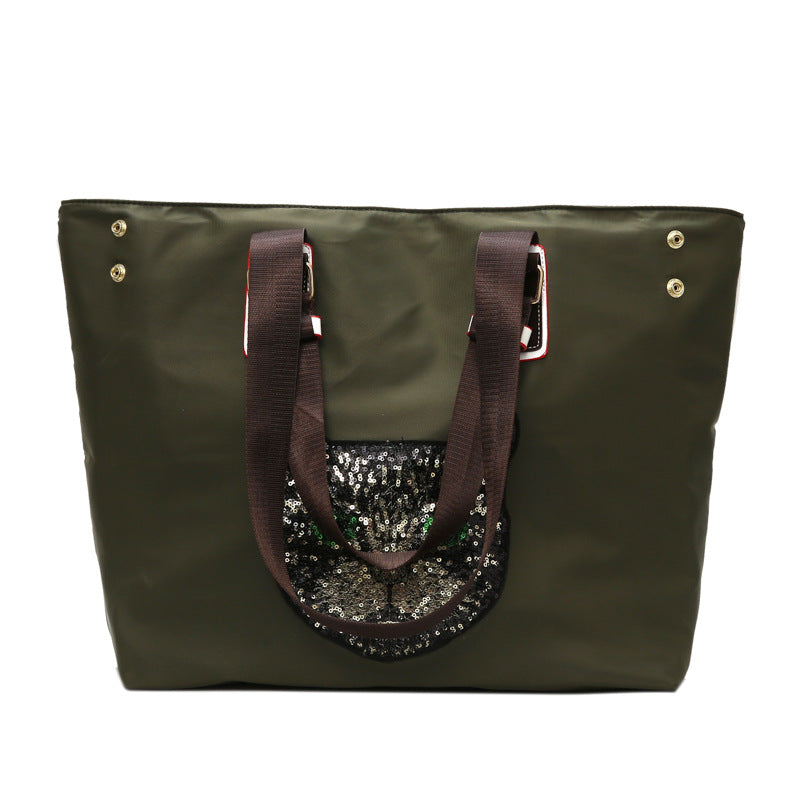 Stylische mit Pailletten dekorierte Tragetasche