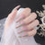 Lange elegante Press-On-Nagel-Set mit Wellen-Design Brehn