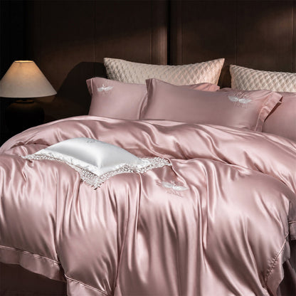 Luxuriöse Satin-Bettwäschegarnitur mit besticktem Schwanenmotiv und Spitzenkissen