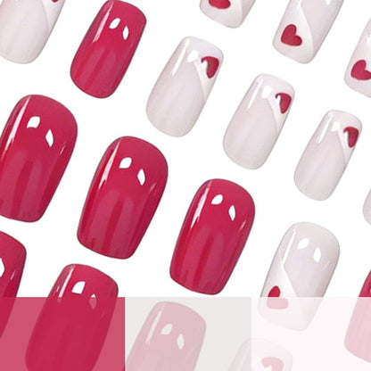 Herz-verzierte Nagelkunst-Verfeinerungen Brehn