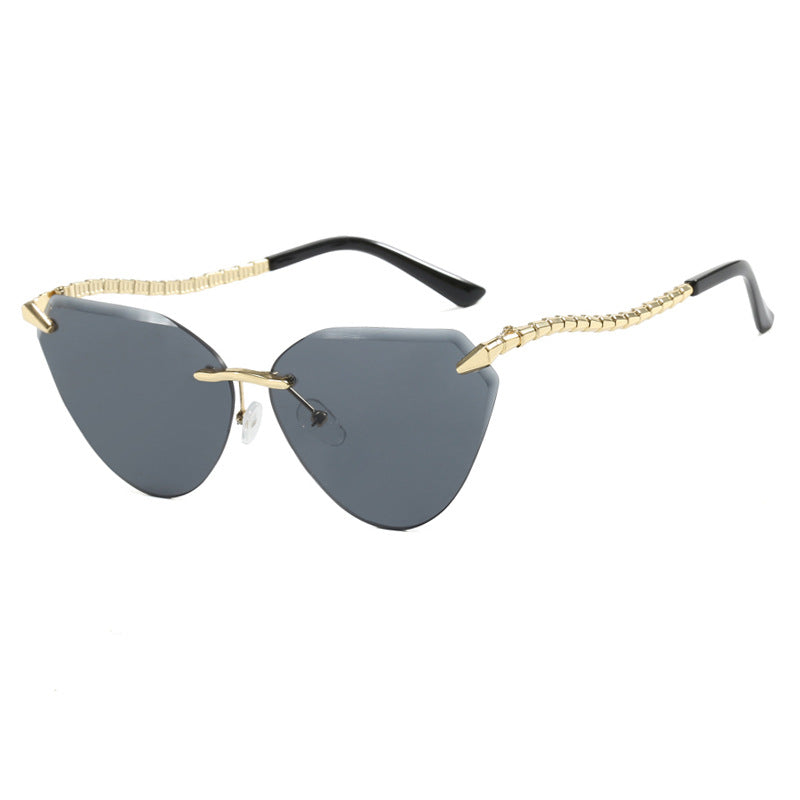Damen Cat-Eye Sonnenbrille mit einzigartigem goldenen Rahmendesign und schützenden Gläsern Brehn