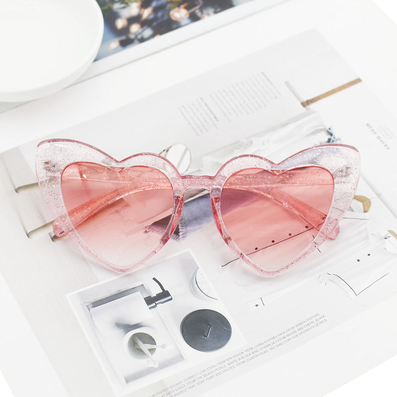 Damen Herzförmige Sonnenbrille mit glitzerndem Rahmen Brehn