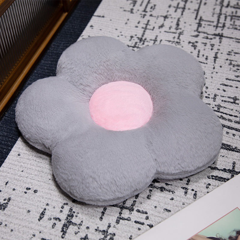 Gepolstertes Sitzkissen in Blumenform mit Kunstleder‑Mittelstück und flauschiger Randpolsterung