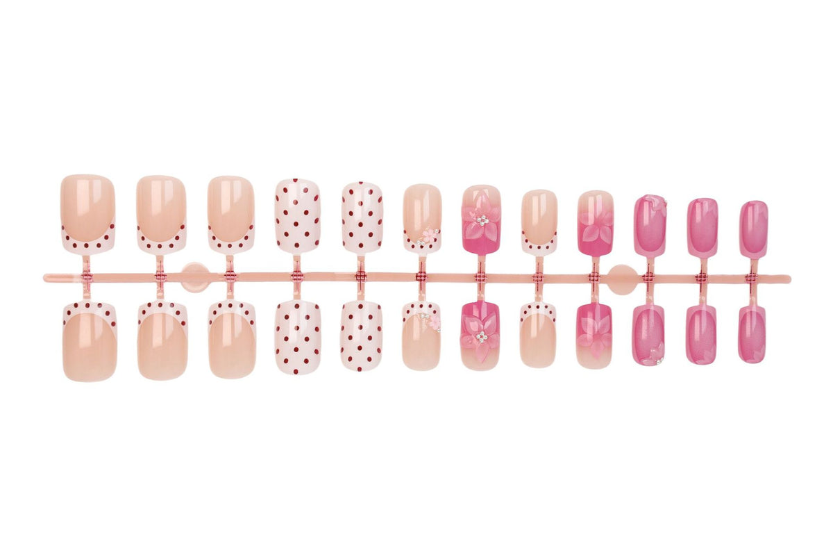 Kunstnagelset mit verspielten Blüten- und Punktmotiv Brehn
