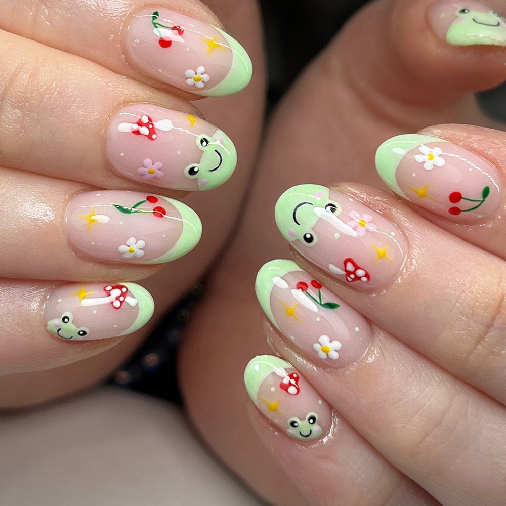 Kunstnagelset mit fröhlichen 3D-Motiven und blühenden Akzenten Brehn
