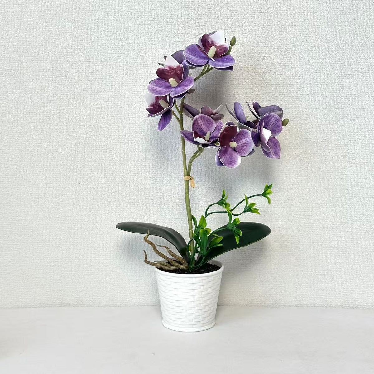 Künstliche Orchideenarrangement für dekorative Innenausstellung