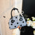 Verspielte Polka-Dot-Mini-Handtasche Brehn