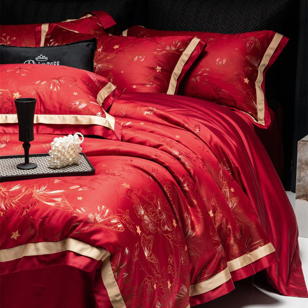 Opulente Satin-Bettwäschegarnitur mit Jacquard‑Blumenmotiv und goldveredelter Zierkante