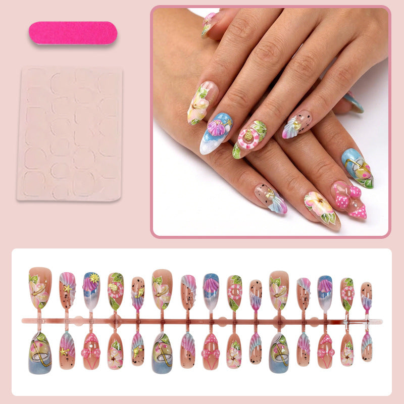 Kunstnagelset mit botanischen Designs und glamourösen Akzenten Brehn