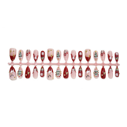 Kunstnagelset mit festlichen Motiven und Glitzerelementen Brehn