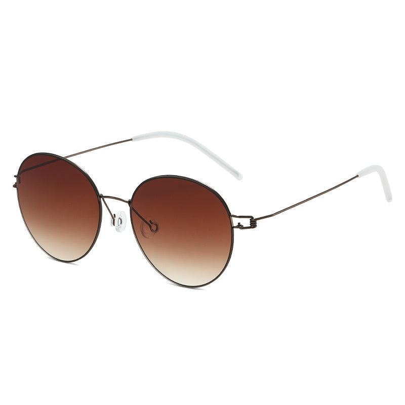 Damen runde Sonnenbrille mit leichtem Metallrahmen und gradienten Gläsern Brehn