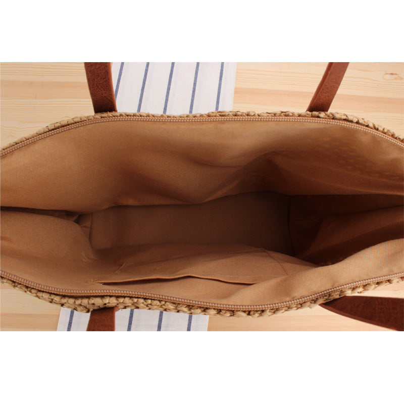 Elegante Bast-Handtasche mit Ledergriffen Brehn