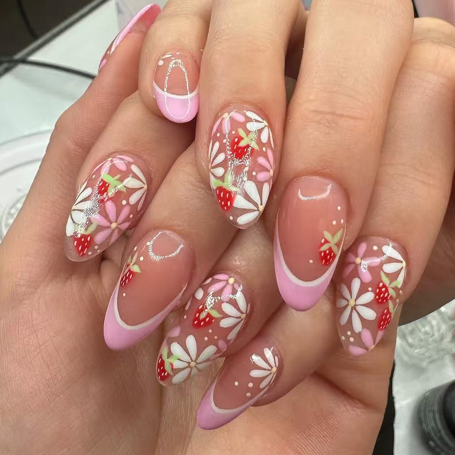 Kunstnagelset mit verspielten Blumen- und Erdbeermotiven Brehn