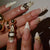 Kunstnagelset mit glamourösen Goldakzenten Brehn