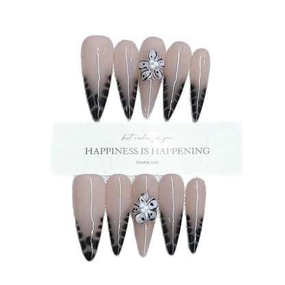 Elegante Stiletto Press-On Nagelset mit floralem Design Brehn