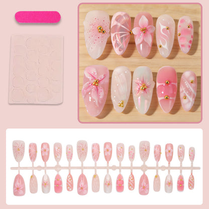 Kunstnägel mit floralen Designs und Glitzerakzenten Brehn