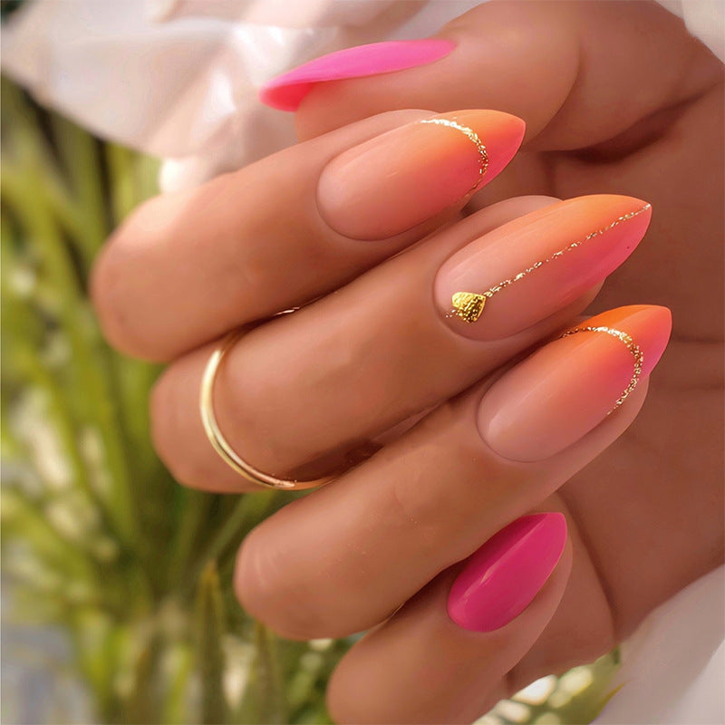 Press-On Nail Set mit lebhaftem Farbverlauf-Design und goldenen Akzenten Brehn