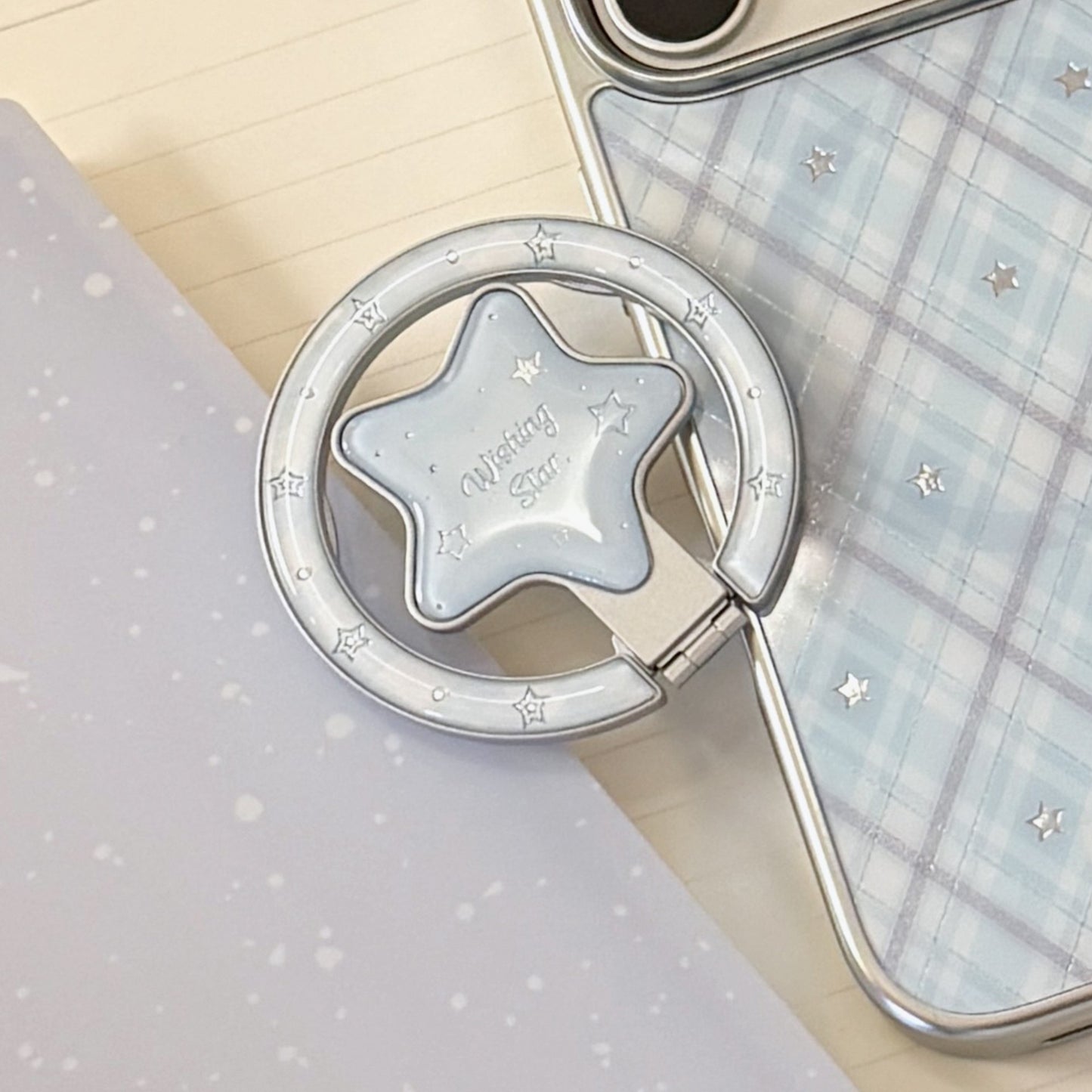 Verspielter Smartphone Fingerhalter im Sternendesign Brehn