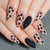 Künstlerische Stiletto Press-On Nägel mit Leoparden Design Brehn