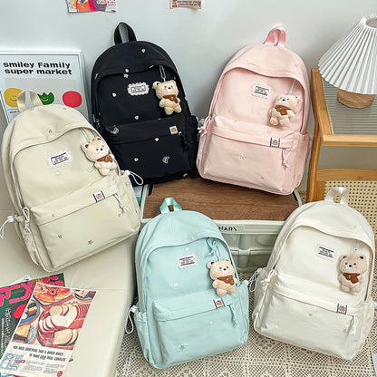 Stylischer backpack mit floralem Schmuck Brehn