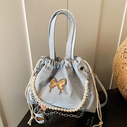 Elegante Mini-Handtasche mit Perlenakzenten und Kordelzug