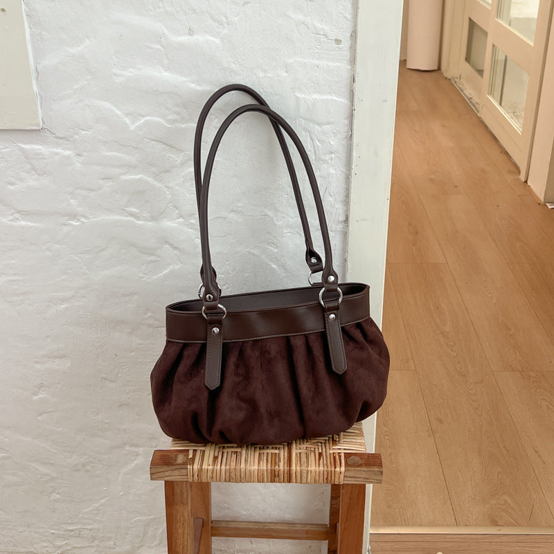 Geraffte Wildleder-Handtasche