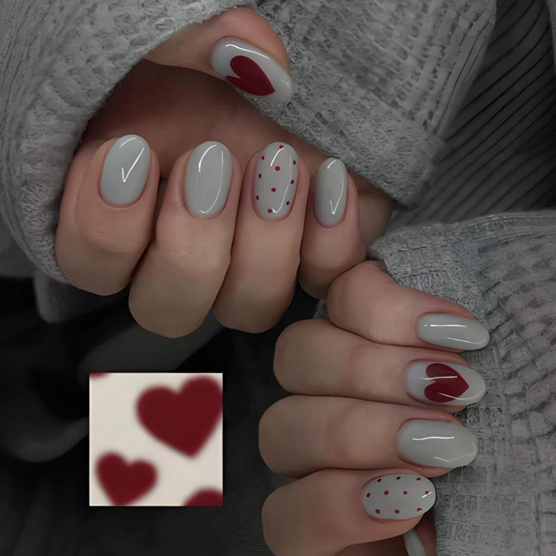 Kunstnagelset mit romantischen Herz- und Punktmotiven Brehn