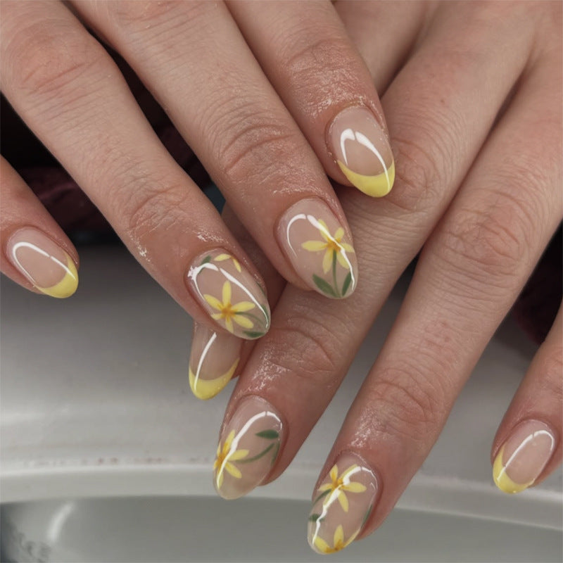 Künstliche Nagelkunst mit verspielten Punkten und Schleifen Brehn