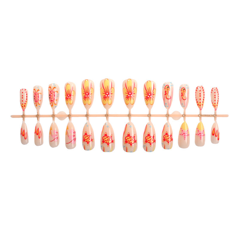 Künstlerisches Press-On-Nagelset mit floralen und bunten Designs Brehn