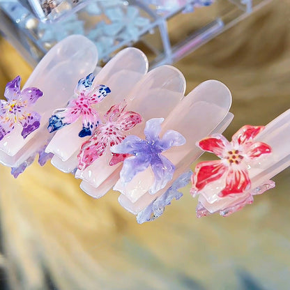 Bunte florale Nagelkunst Dekorationen